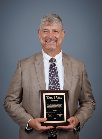Bradd Mertz accepting ASHE Award 2026
